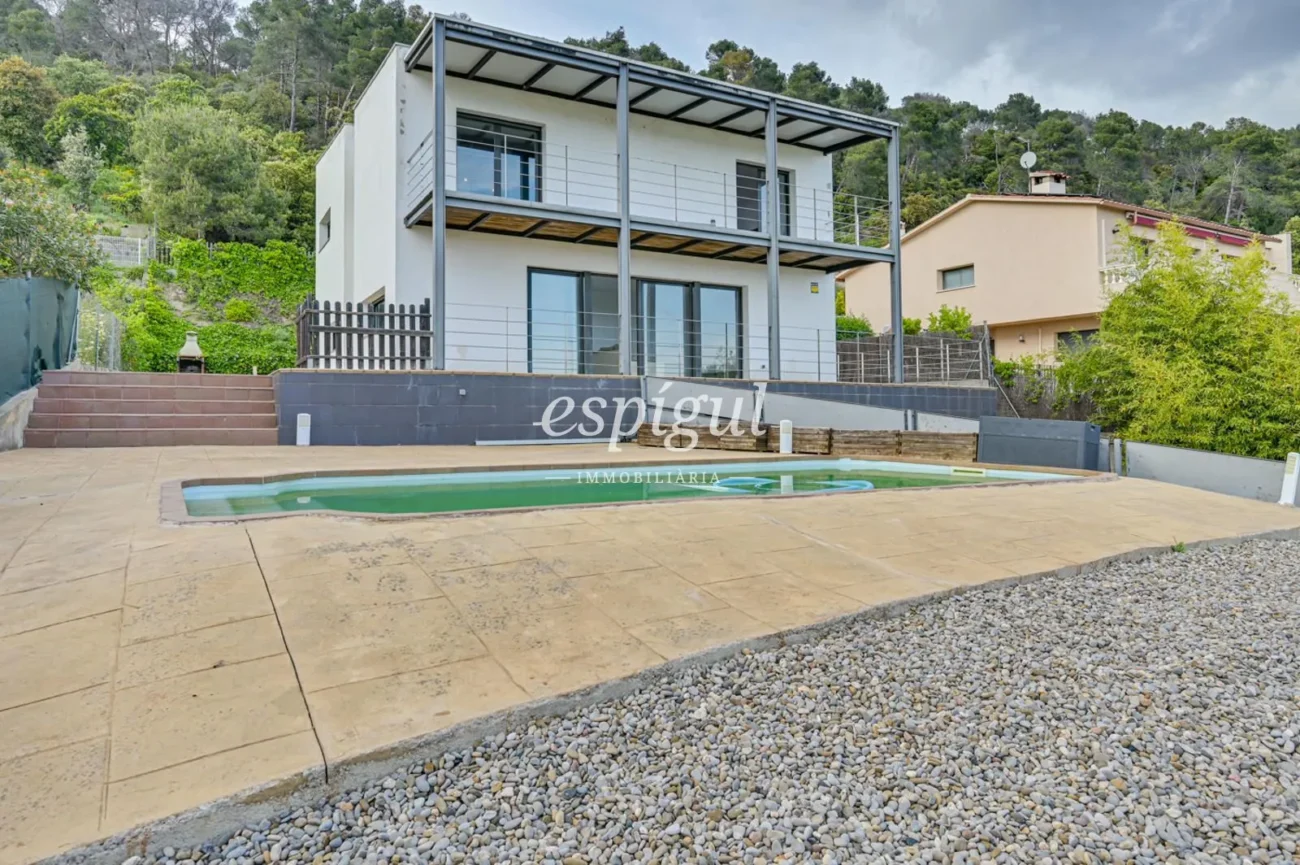 Designer villa with panoramic views, private garden and pool in Can Regasol