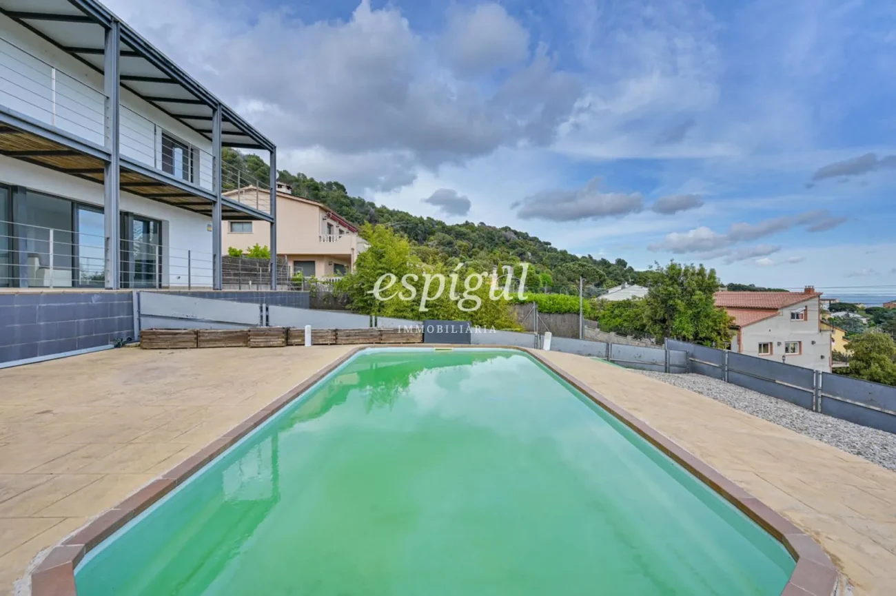 Designer villa with panoramic views, private garden and pool in Can Regasol