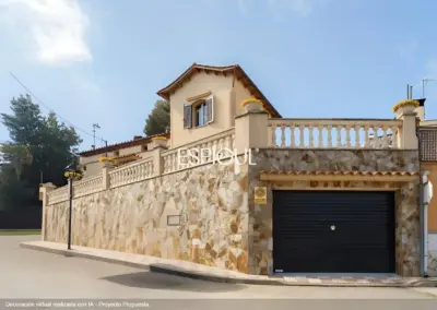 Detached house with a garden and private pool, very close to Teià center.