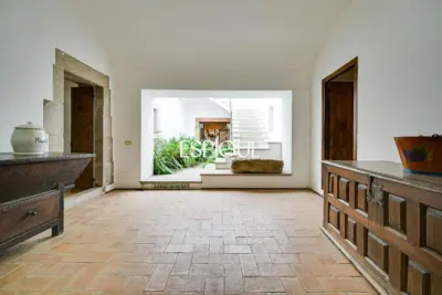 Exclusiva casa de pueblo con jardín en el centro