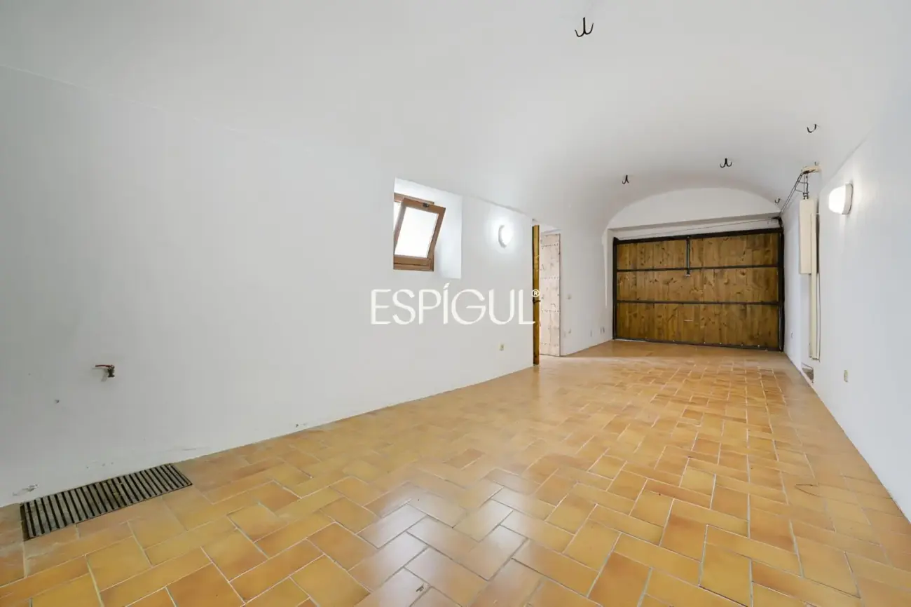 Exclusiva casa de pueblo con jardín en el centro