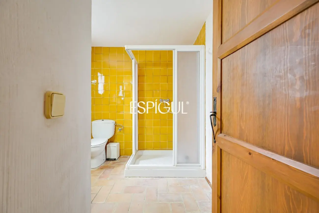 Exclusiva casa de pueblo con jardín en el centro