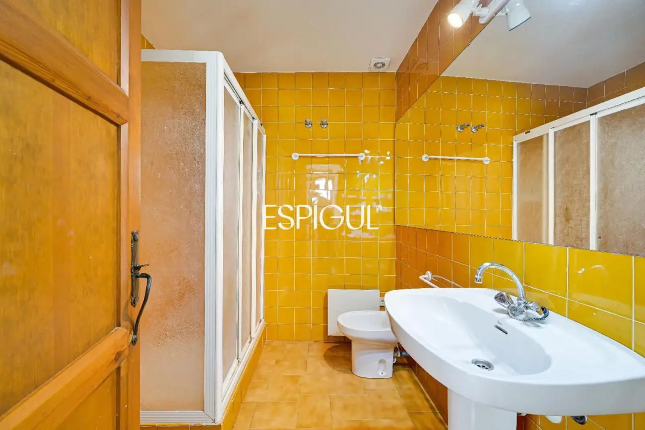 Exclusiva casa de pueblo con jardín en el centro